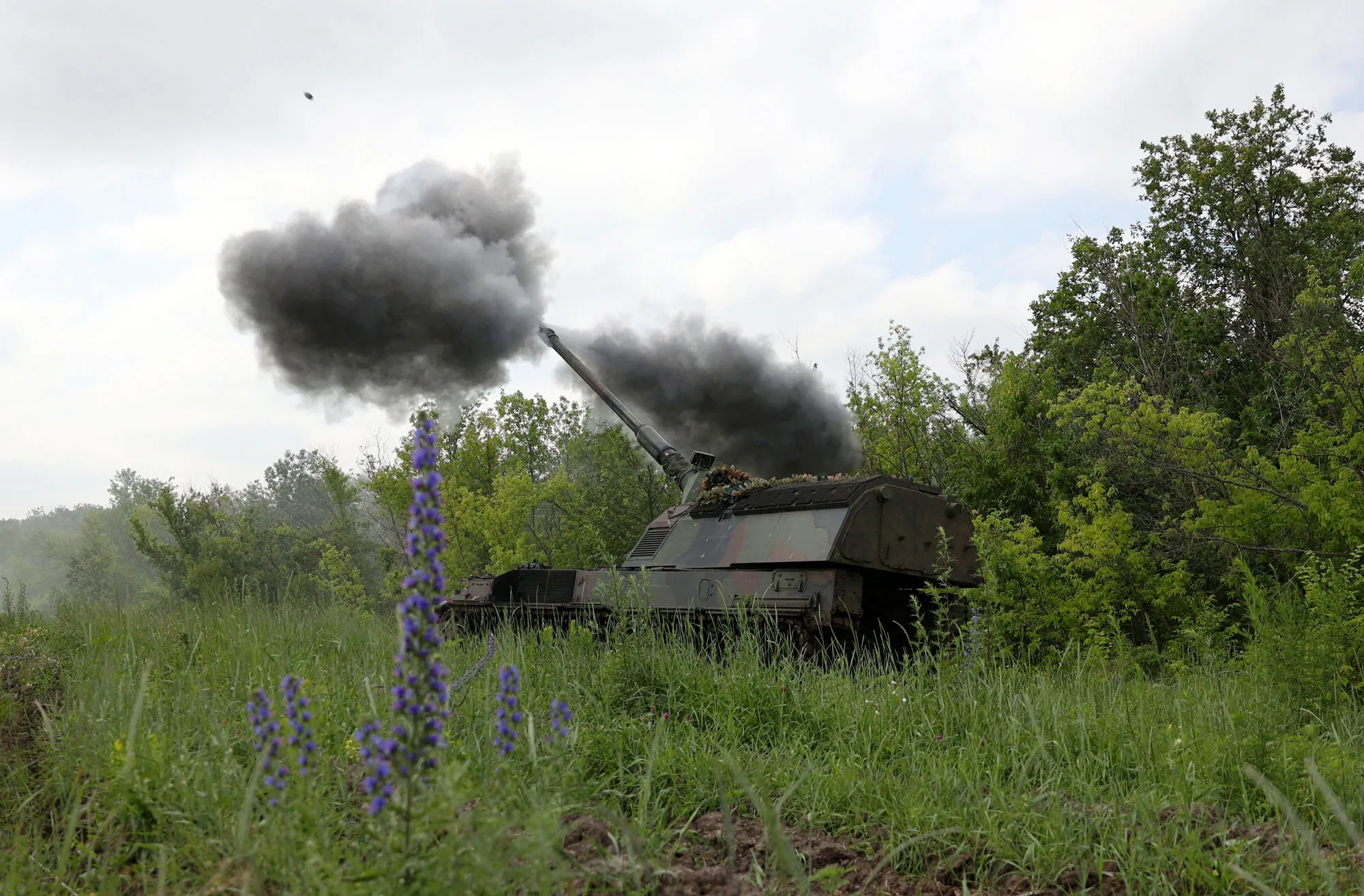 Ukrainian servicemen fire a PzH 2000 self-propelled howitzer toward Russian positions near Bakhmut, Ukraine.