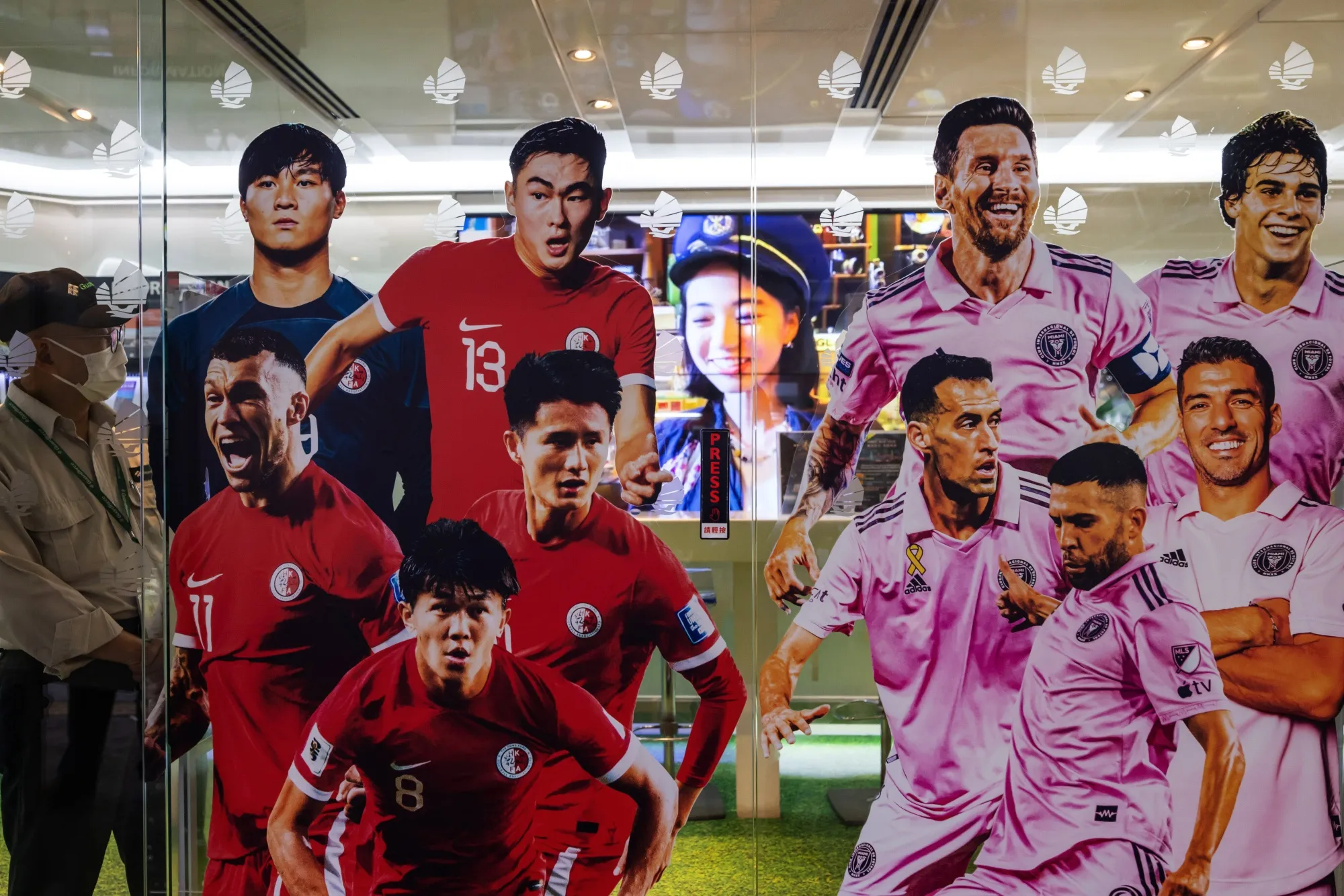 An advertisement for the&nbsp;Inter Miami one-off exhibition match on a window in Hong Kong.