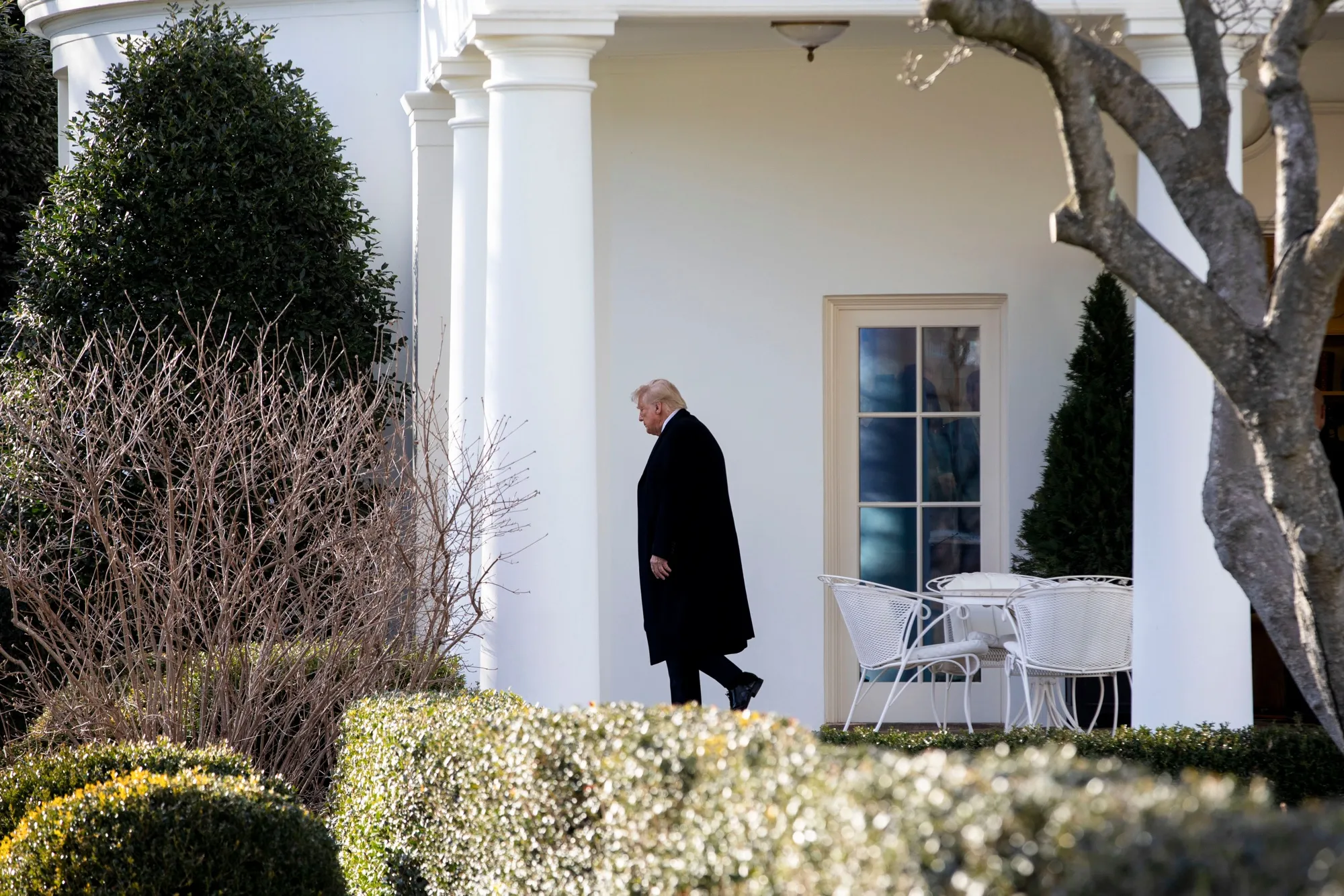 US President Donald Trump exits the Oval Office of the White House before boarding Marine One in Washington on Feb. 7.