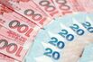 Hong Kong Dollar, Chinese Yuan and US Dollar Banknotes As Currency Peg Intervention From HKMA Continues Into Third Day