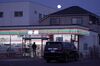 A 7-Eleven convenience store, operated by Seven & i Holdings Co., stands under a full moon in Tokyo, Japan, on Friday, Jan. 10, 2020. Japan is scheduled to release producer price index (PPI) figures on Jan. 16.
