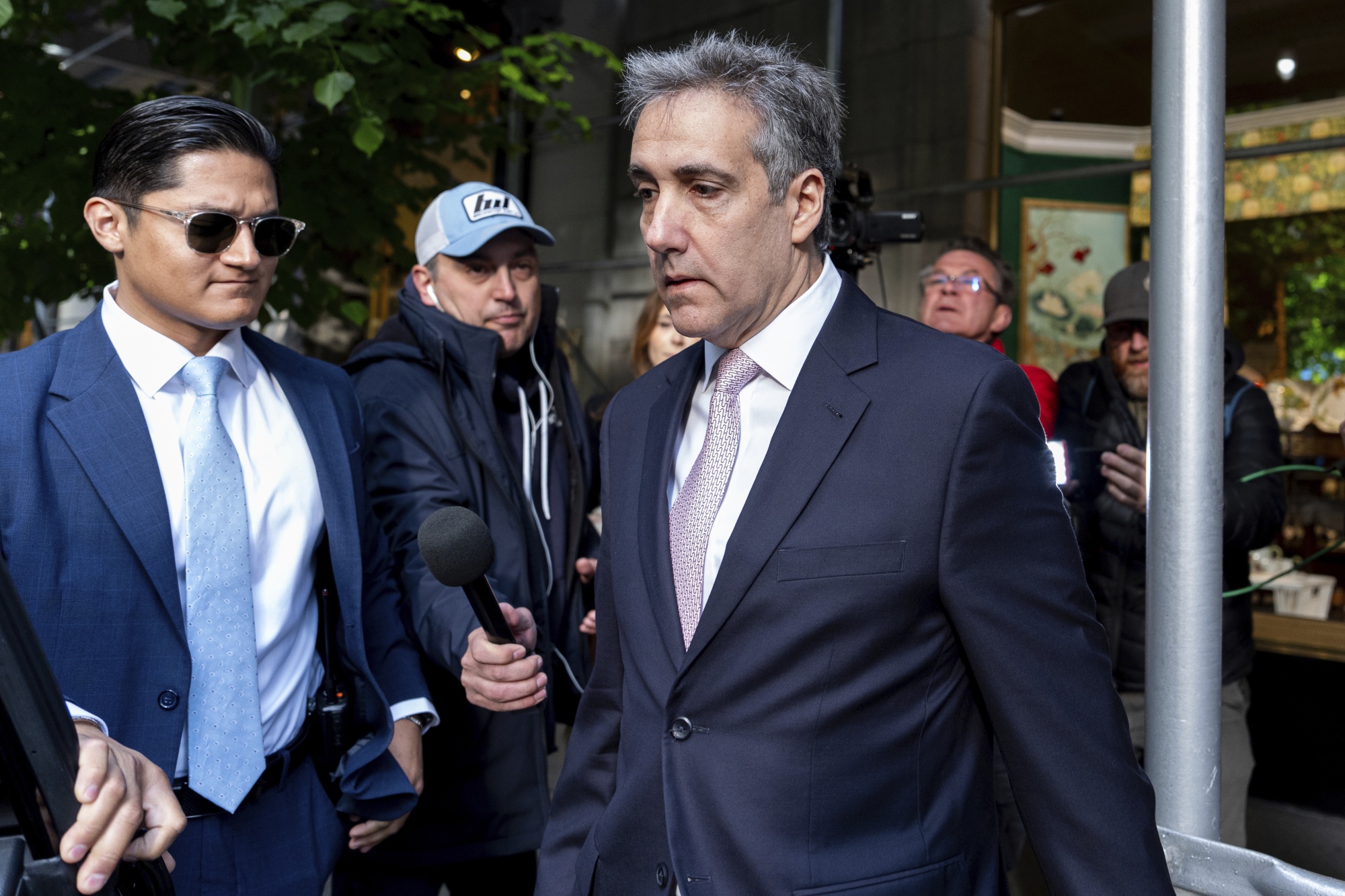 Michael Cohen leaves his apartment building on his way to Manhattan criminal court, on May 13.