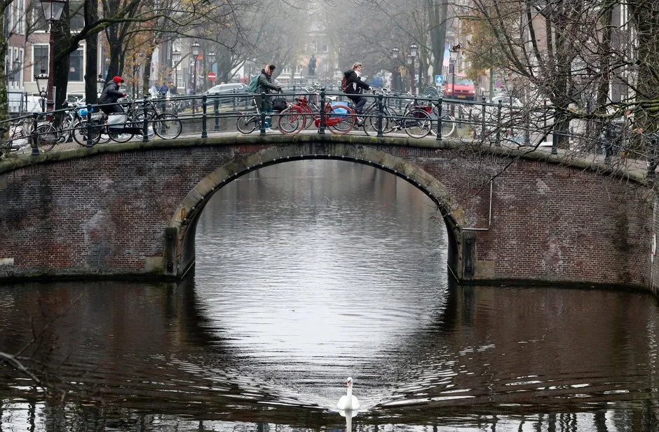 Amsterdam's love of bikes is matched only by its growing antipathy toward private automobiles.