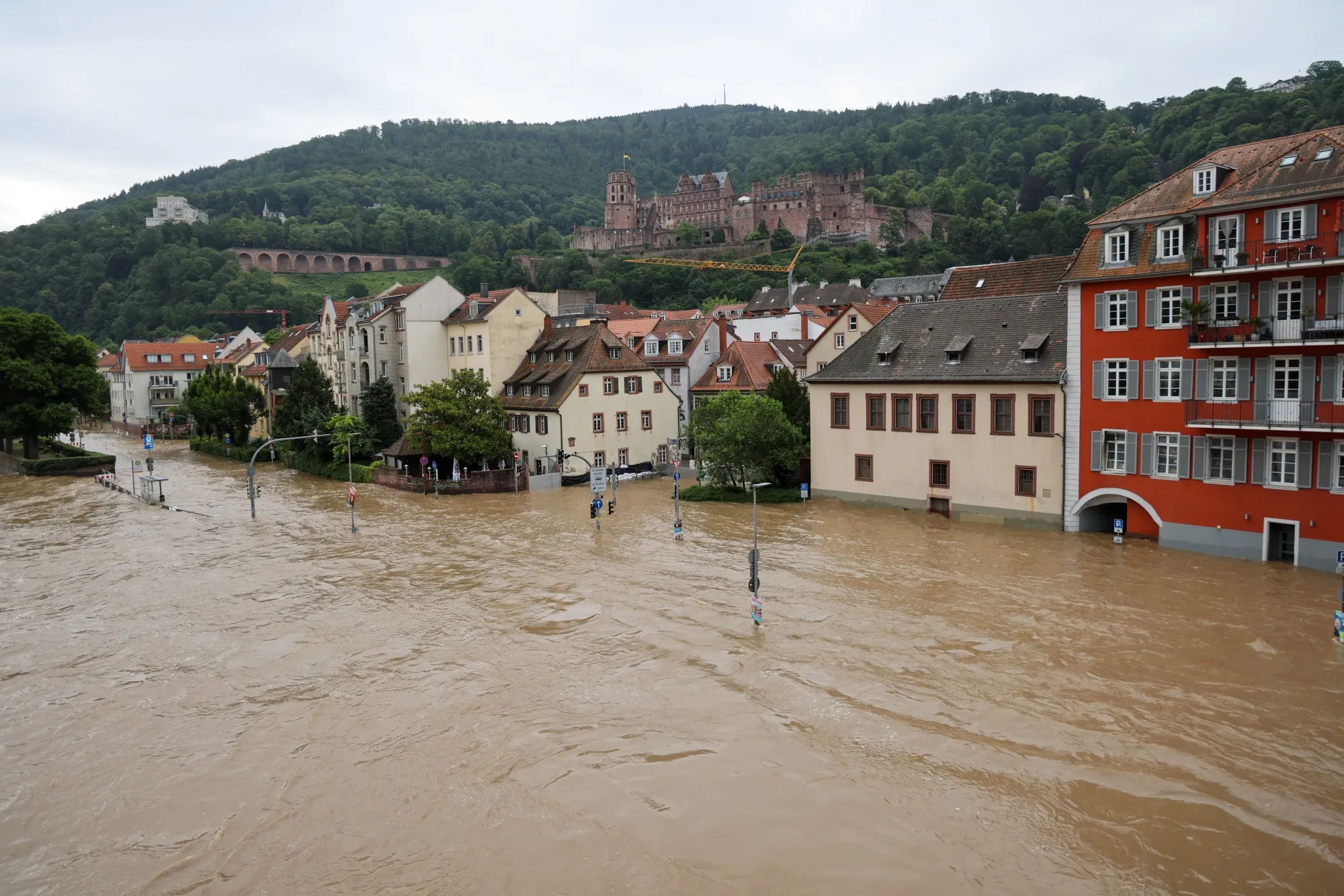A flooded street running parallel with the River Neckar in Heidelberg, Germany, on&nbsp;June 3.