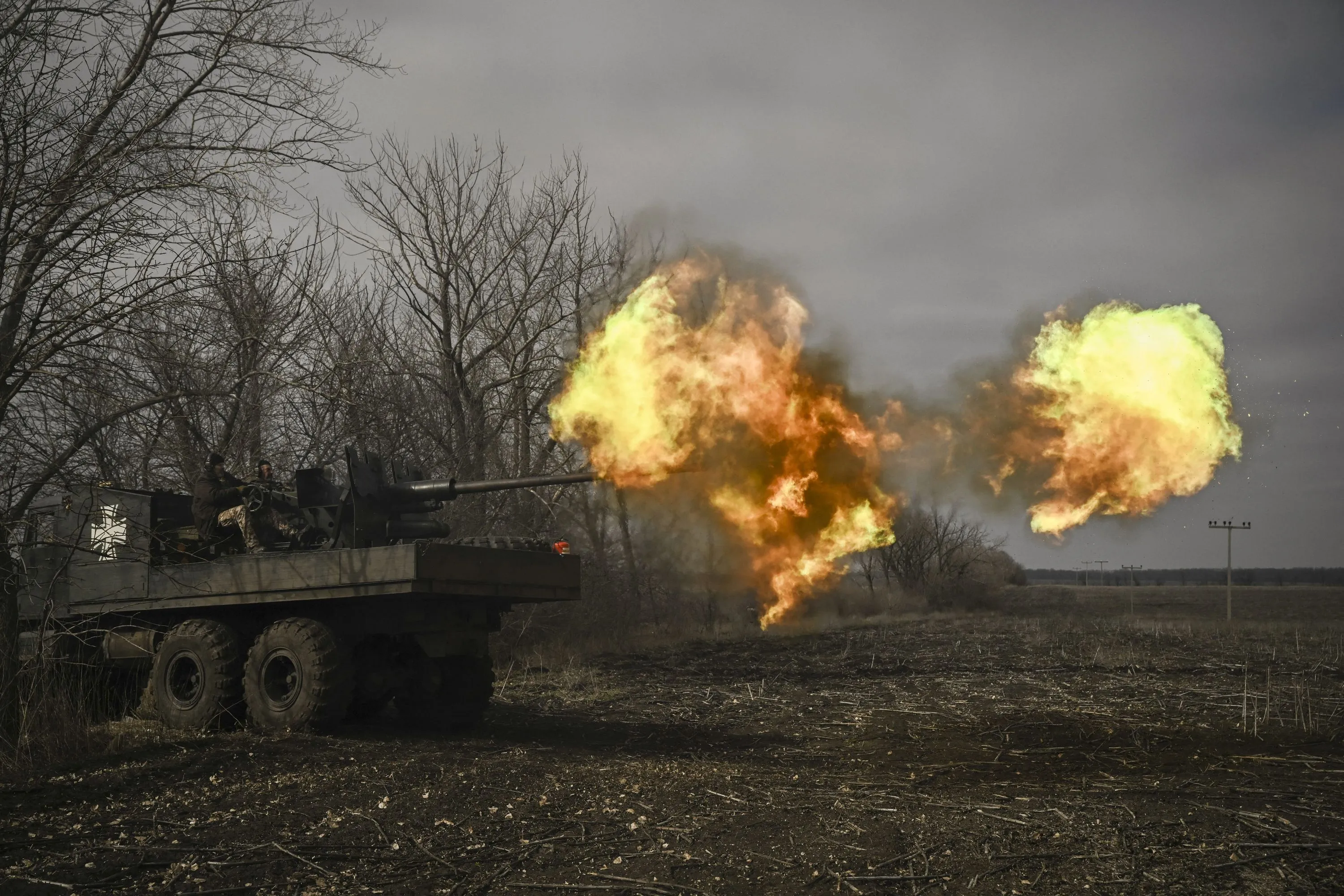 Ukrainian servicemen fire with an anti-aircraft gun at Russian positions near Bakhmut, Ukraine.&nbsp;
