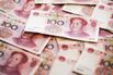 Yuan And Dollar Banknotes Ahead Of Tenth Anniversary Of China's Yuan Reform