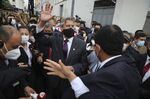 Francisco Sagasti waves to the crowd after Congress chose him to become the nation’s third president in the span of a week in Lima on Nov. 16.