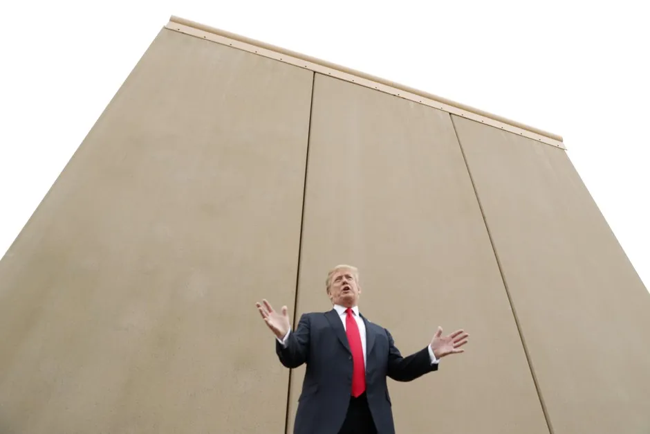 President Donald Trump shows off U.S.-Mexico border wall prototypes in March 2018.