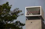 Signage for Toshiba Corp. is displayed at the company's headquarters in in Tokyo, Japan, on Tuesday, April 3, 2018.