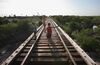 Caution: Don't stop on the tracks.