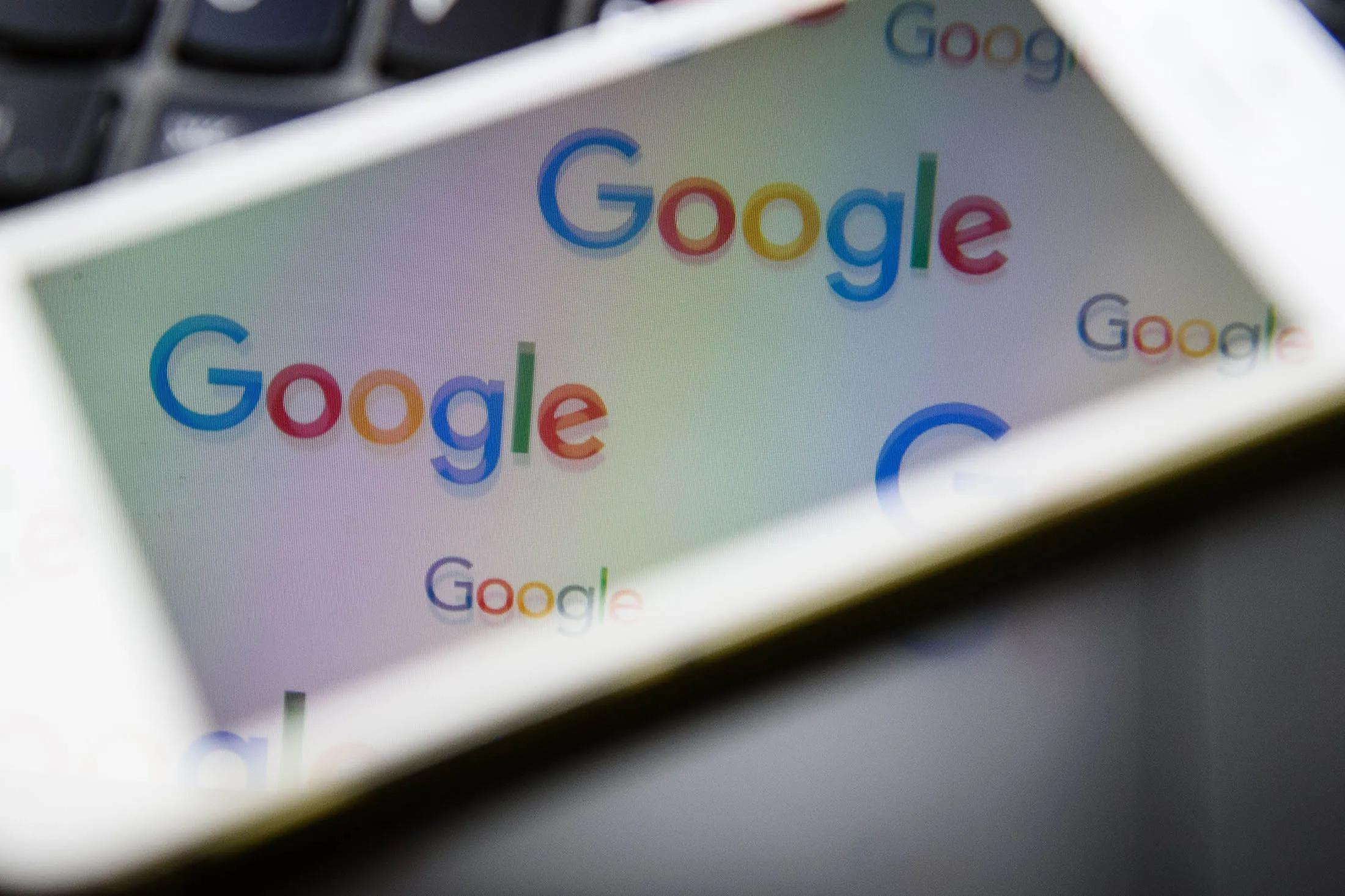 The logo for US technology company and search engine Google is displayed on screens in London on February 11, 2016. Britain's tax agency announced last month that Google would pay a £130 million (166 million euro, $187 million) tax settlement for 10 years' operations in Britain where it makes 11 percent of its global sales. Finance minister George Osborne hailed the agreement as a victory. But there was a barrage of criticism, including from within Prime Minister David Cameron's own Conservative Party as the announcement coincided with a key tax filing deadline for many Britons. / AFP / LEON NEAL (Photo credit should read LEON NEAL/AFP/Getty Images)

