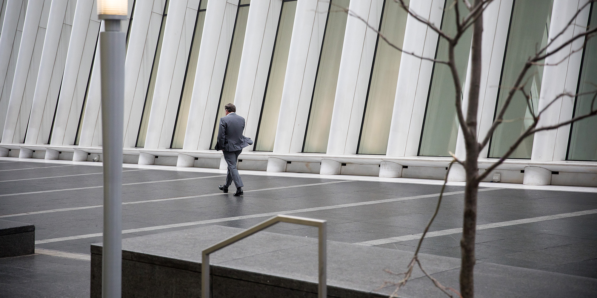 A pedestrian walks past the Oculus transportation hub in New York.