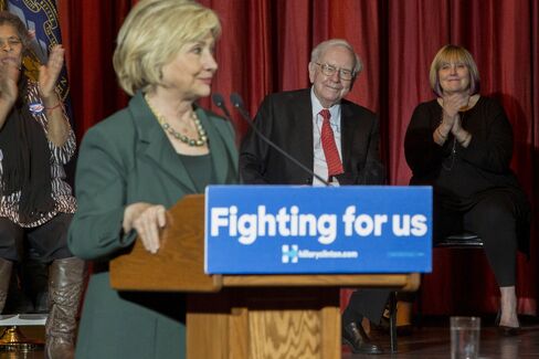 Warren Buffett and daughter Susan Buffett attend a Hillary Clinton campaign event at the Sokol Auditorium in Omah