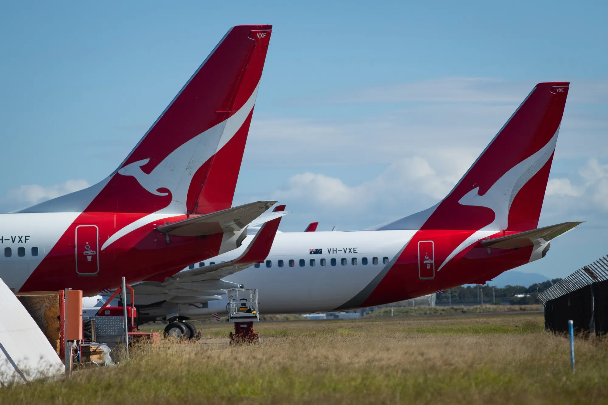 Grounded Quantas Aircraft at Brisbane Airport as Airlines Expected to Lose Over $84 Billion This Year 