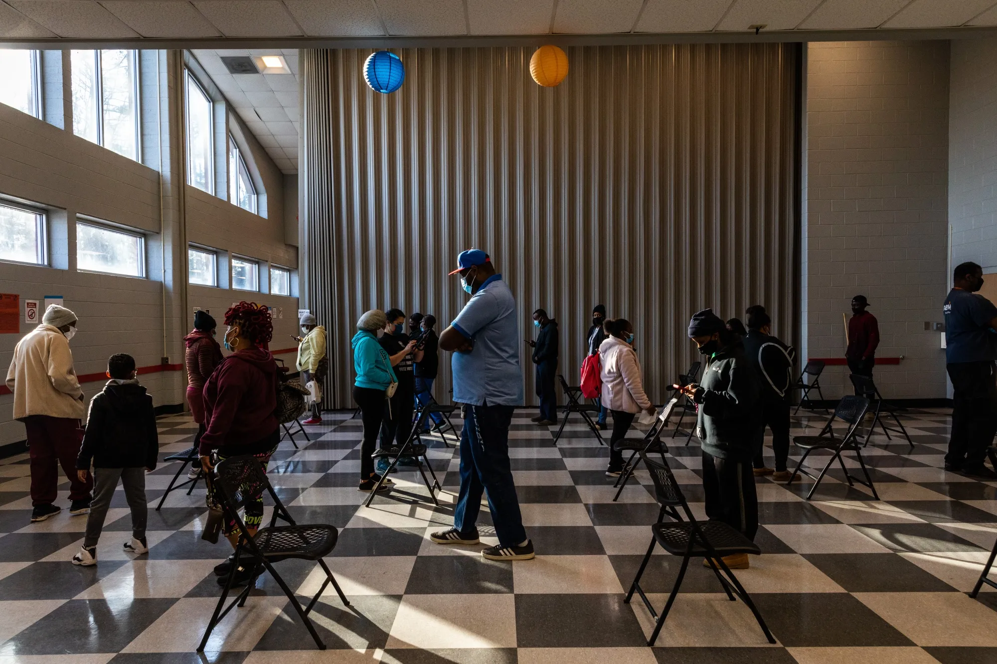 Voters stand in line to vote during the Senate runoff elections in Atlanta, Georgia, in January.