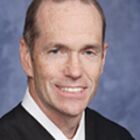 Headshot of Hon William Q Hayes