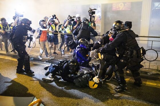 China Warns Hong Kong Unrest Goes ‘Far Beyond’ Peaceful Protest