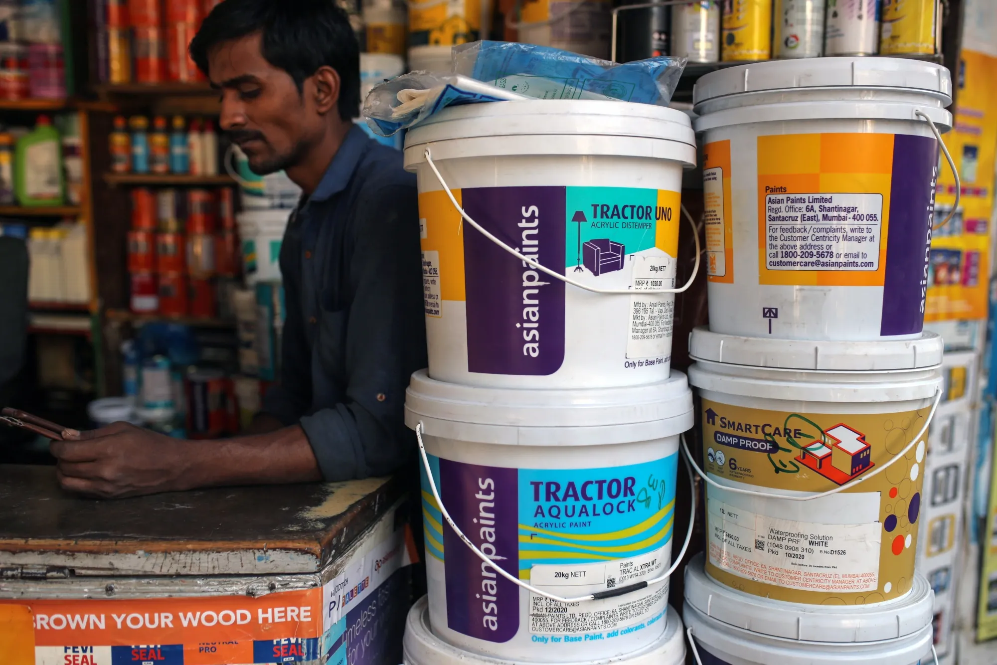Buckets of Asian Paints Ltd. paint at a store in Mumbai.