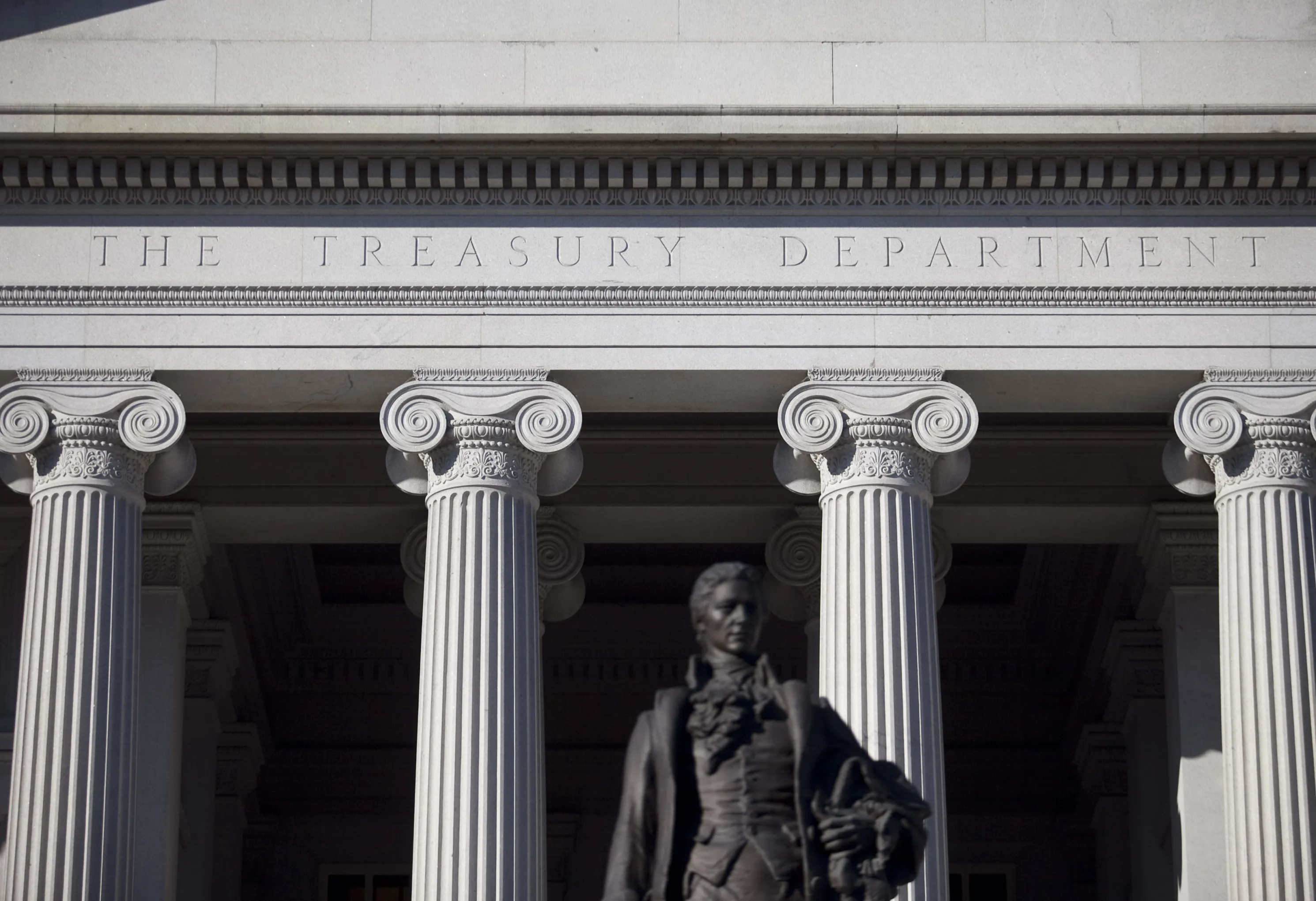 A statue of Alexander Hamilton stands in front of the U.S. Department of the Treasury in Washington, D.C., U.S.