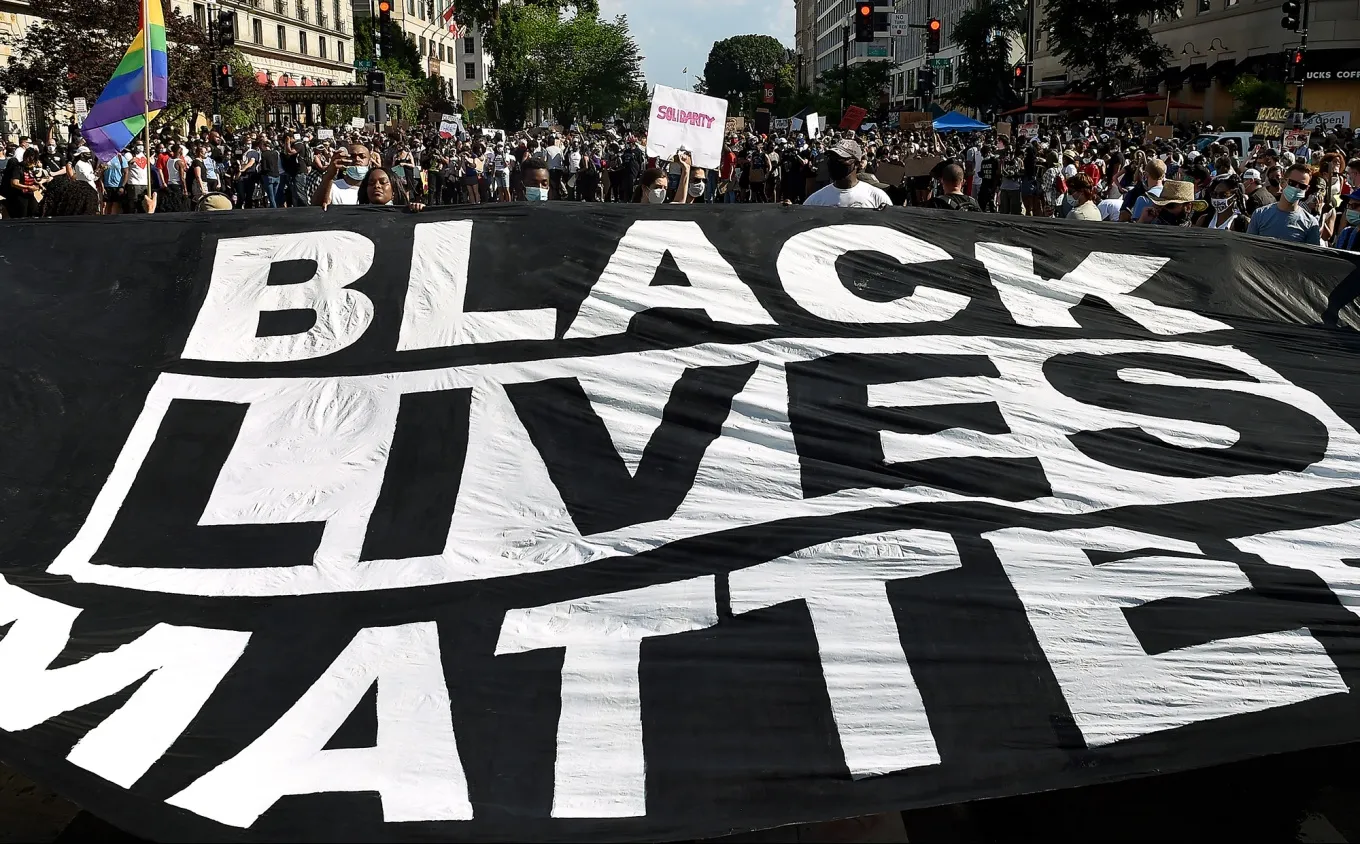 Demonstrators deploy a Black Lives Matter banner&nbsp;in Washington, D.C.&nbsp;in 2020.