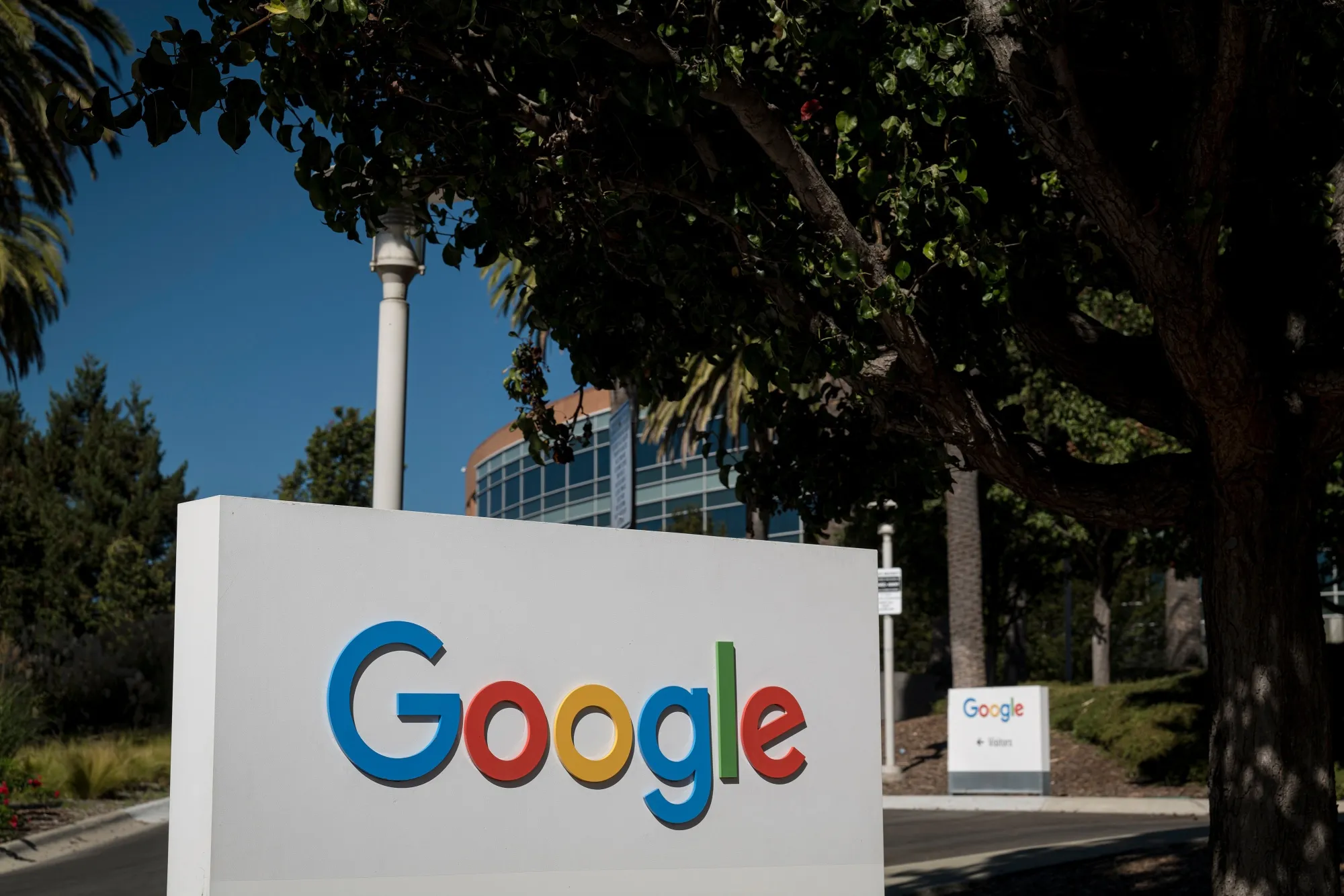 Signage is displayed in front of a building on the Google campus in Mountain View, California, U.S., on Wednesday, Oct. 21, 2020.&nbsp;
