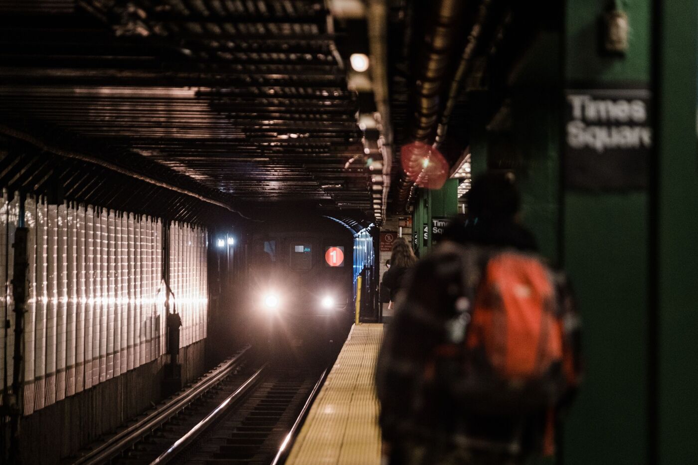A subway train arrives at the Times Square station in New York, U.S., on Tuesday, Nov. 17, 2020.