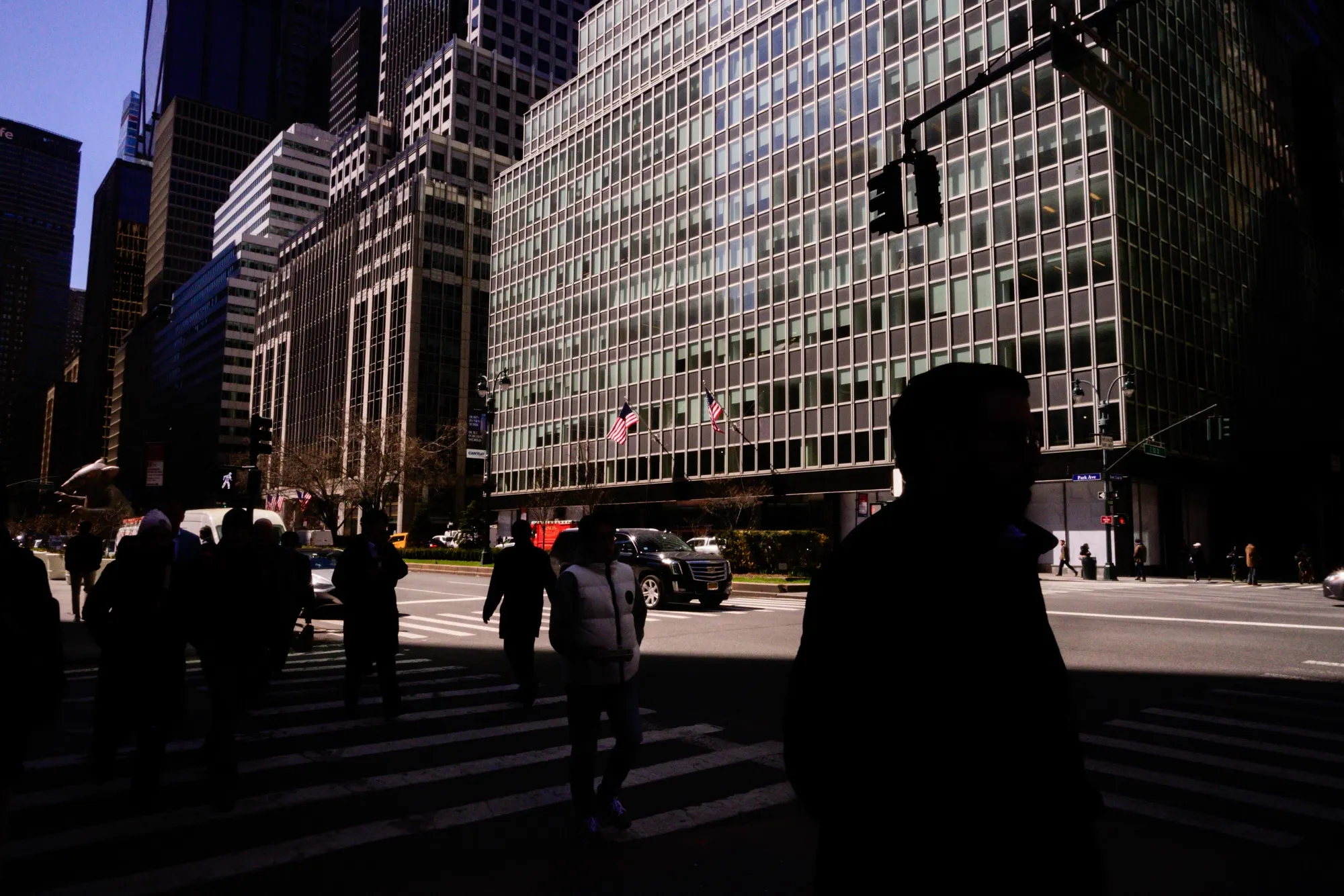 Pedestrians on Park Avenue in the Plaza District of New York.