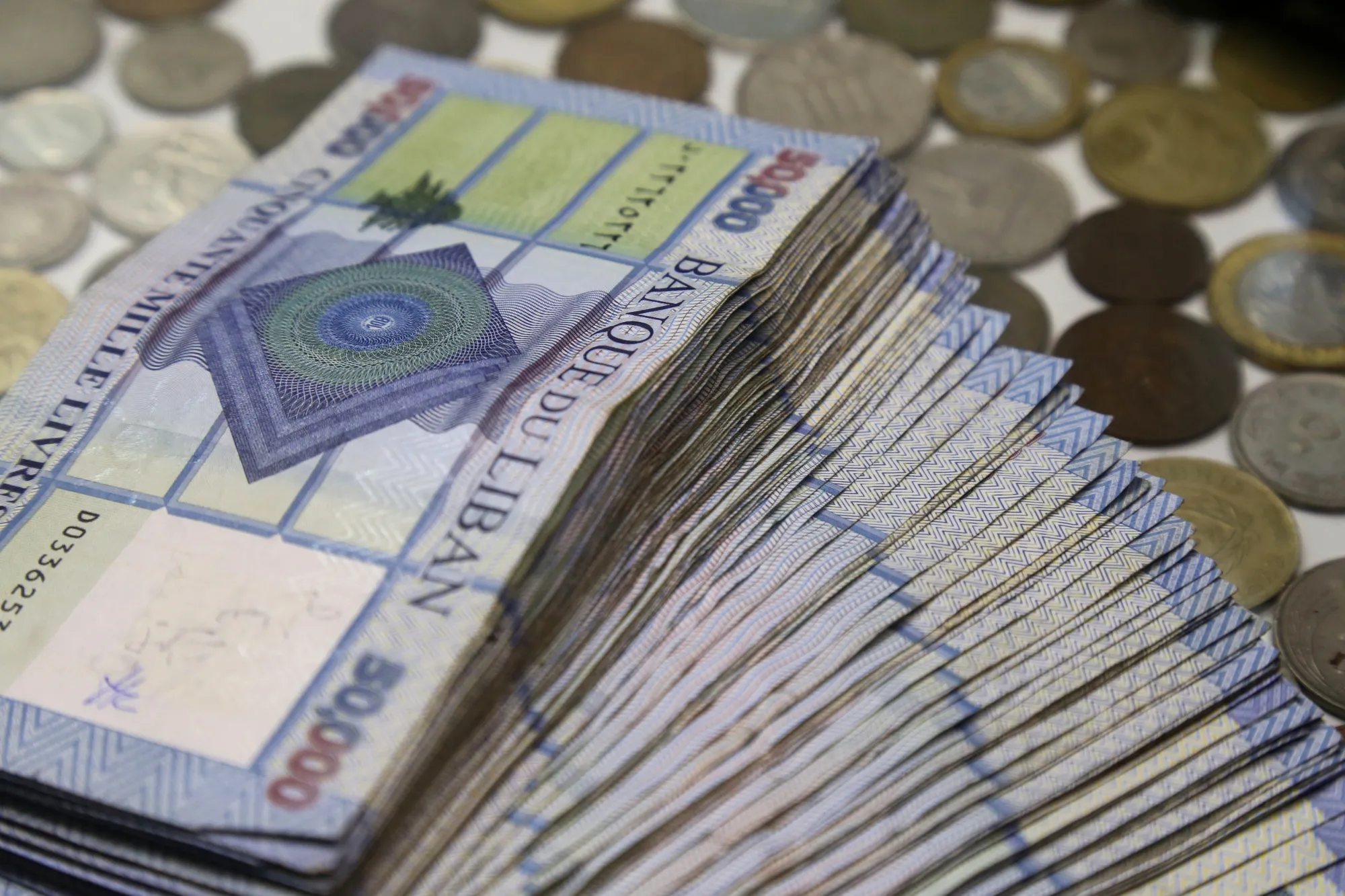 A pile of 50,000 denomination Lebanese pound banknotes