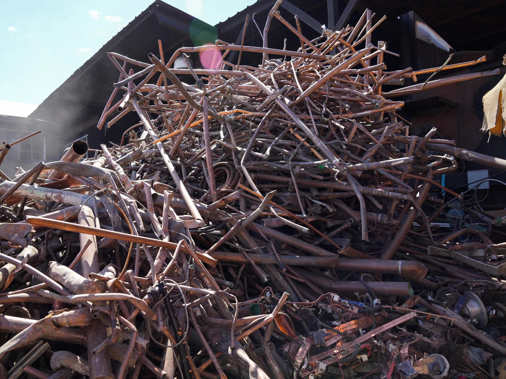 Heaps of the copper metal scraps are piling up at yards around the country.