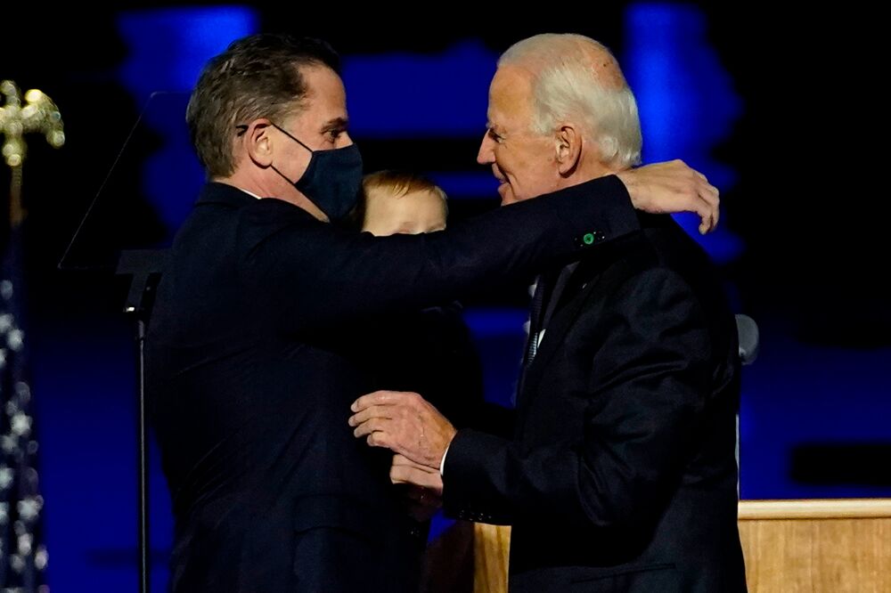 Hunter Biden embraces his father President-elect Joe Biden in Wilmington, Delaware on Nov. 7.
