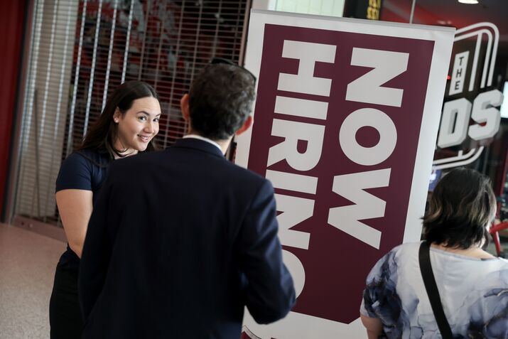 Job Seekers Look For Employment Opportunities At Job Fair In Sunrise, Florida