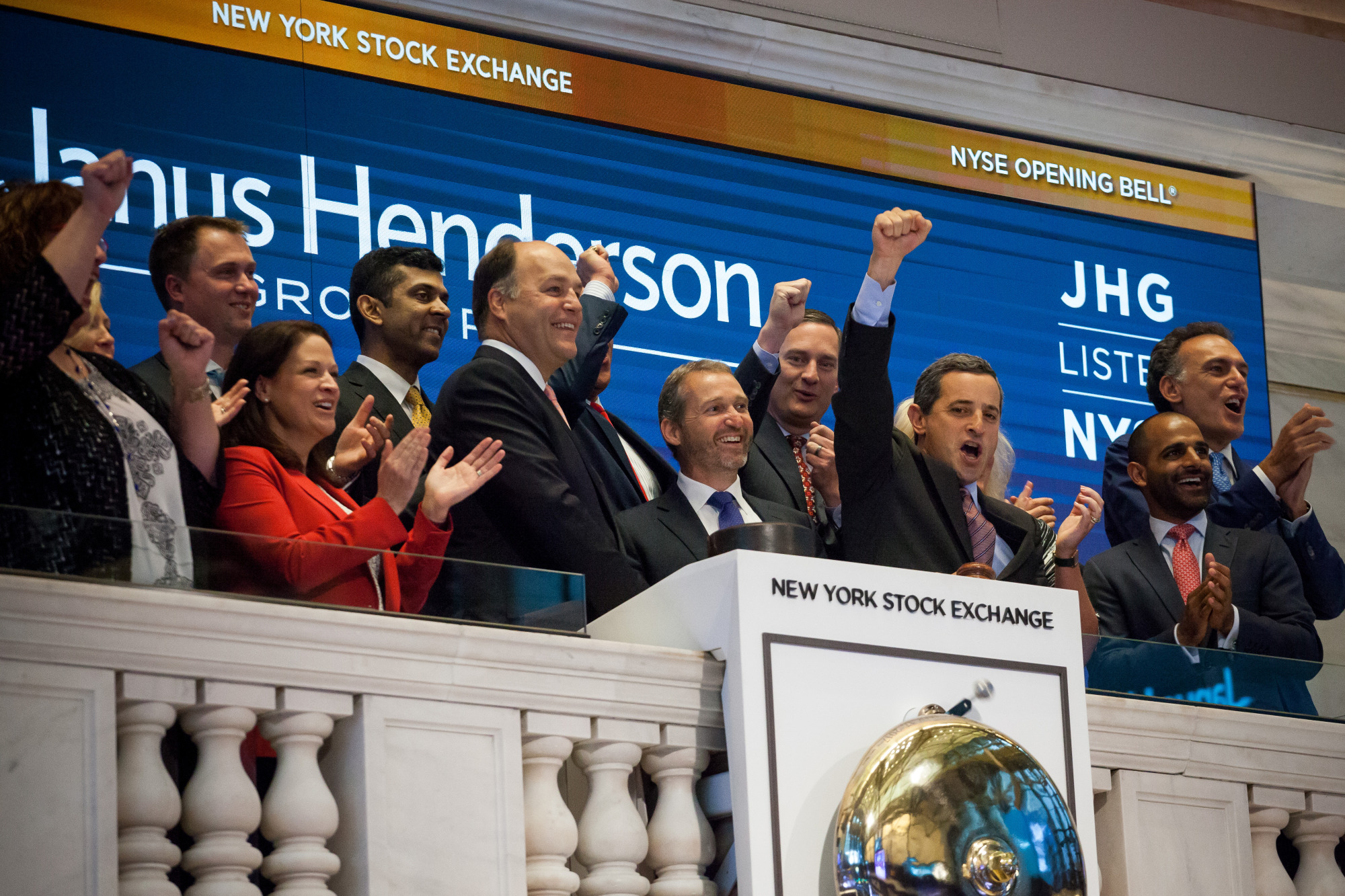 Dick Weil, center left, and Andrew Formica, center, on the floor of the New York Stock Exchange. 