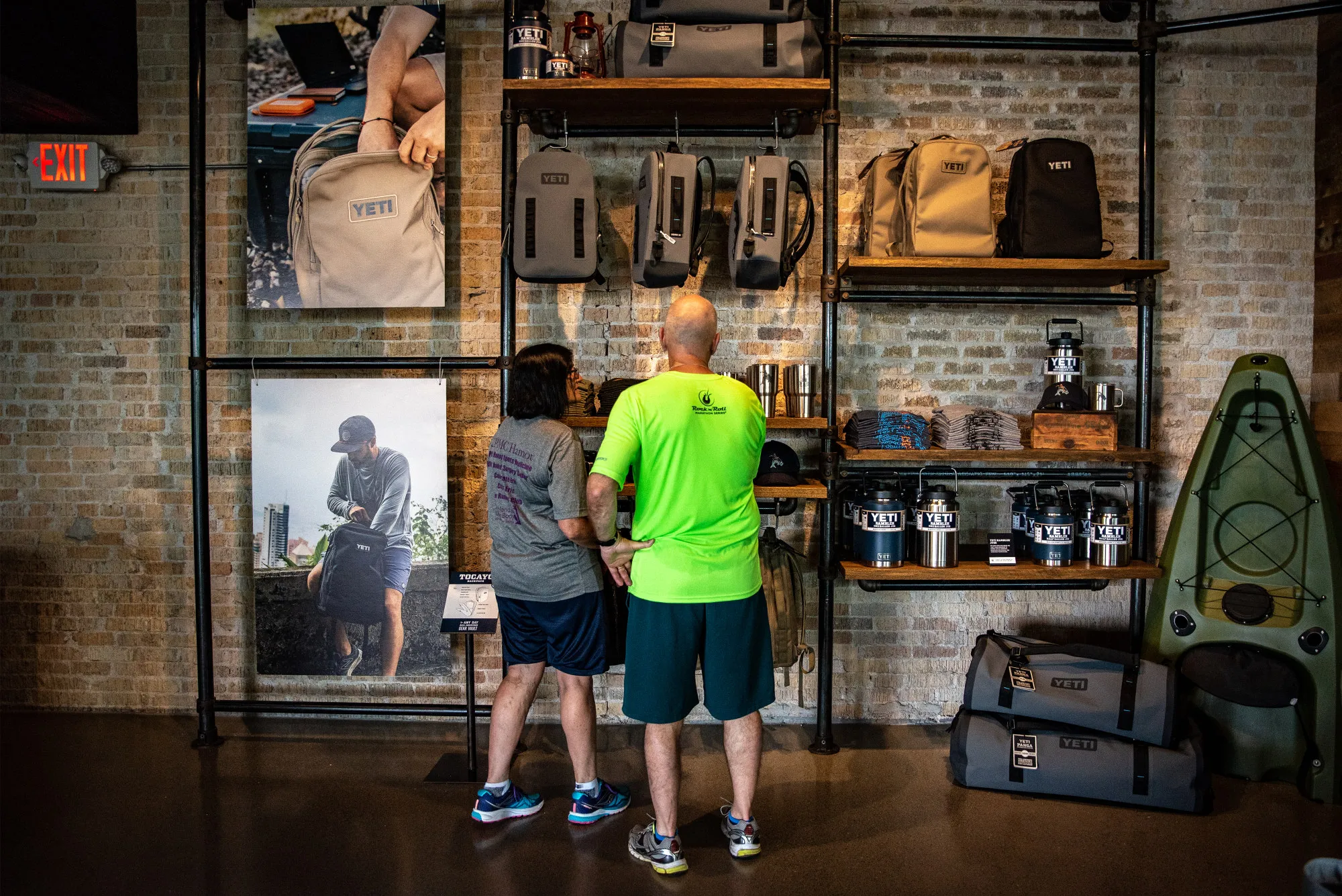 Shoppers browse backpacks on display for sale at the Yeti Holdings Inc. flagship store in Austin, Texas.