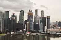 Singapore's Central Bank Sees 'Gradual and Uneven' Recovery 