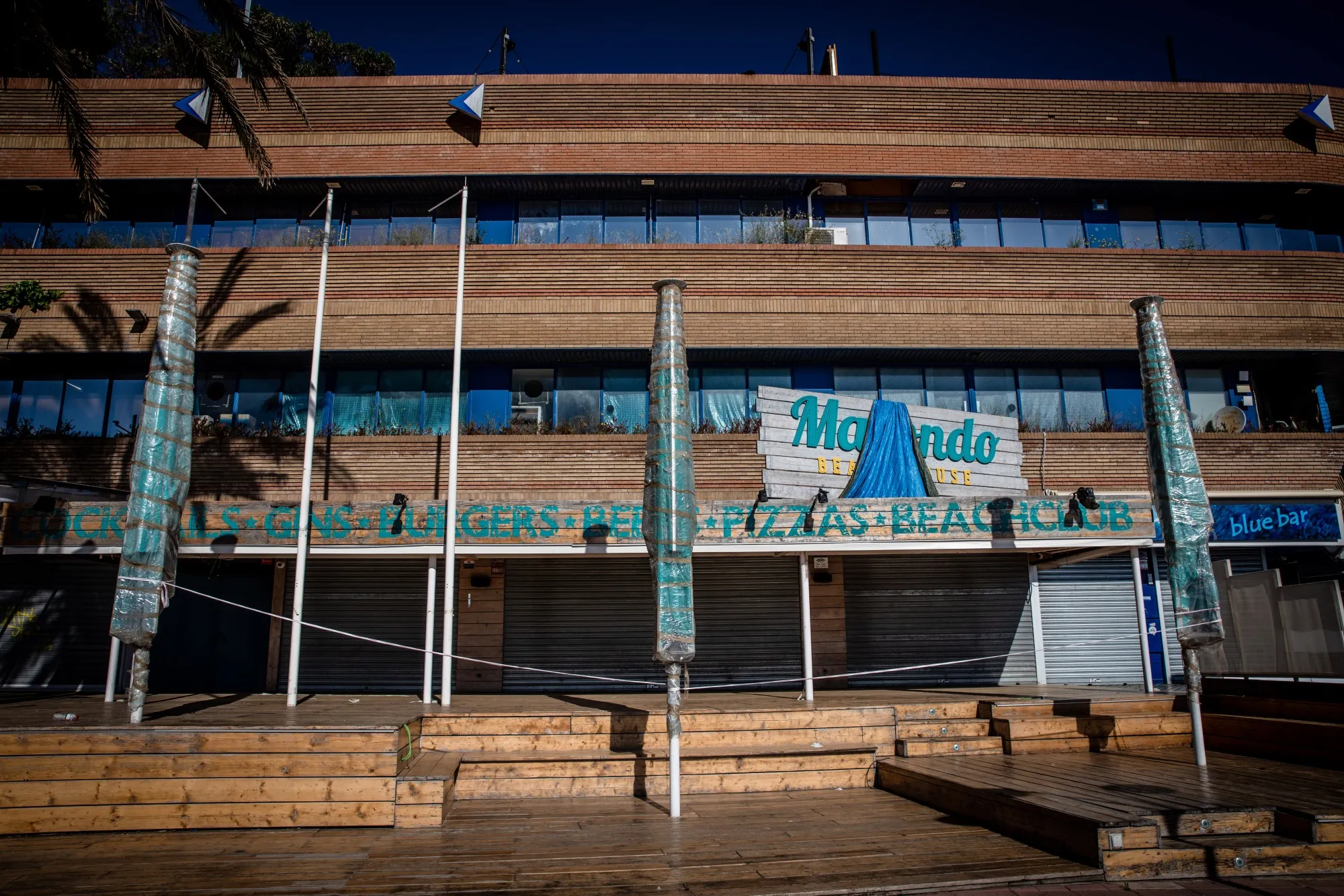 A shuttered beachside bar and restaurant in Lloret de Mar, Spain, in May.