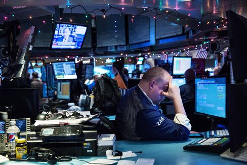 A trader works on the floor of the New York Stock Exchange during the afternoon of Jan. 4, 2016 in New York City.
