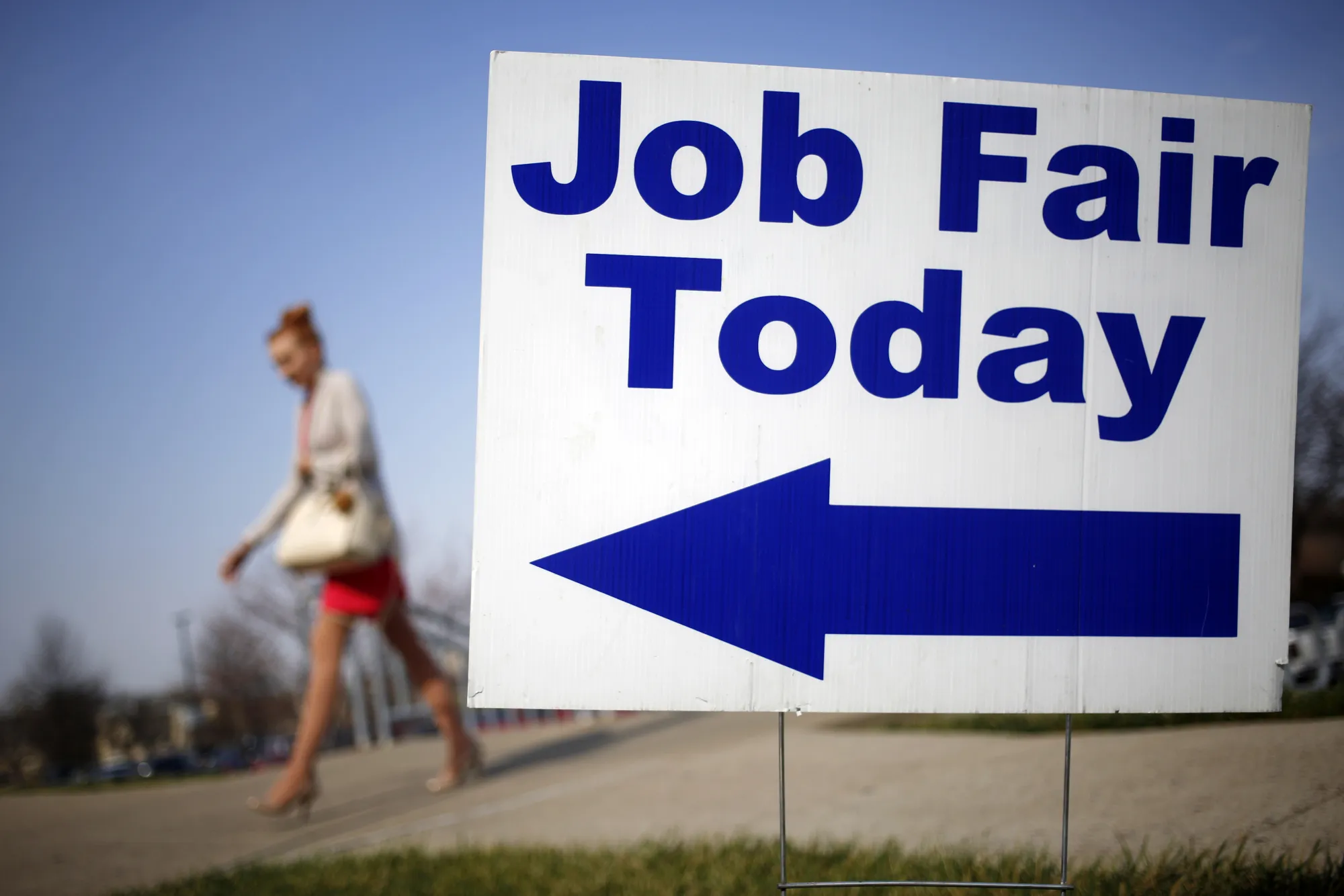 Signage is displayed outside a career fair in Overland Park, Kansas.