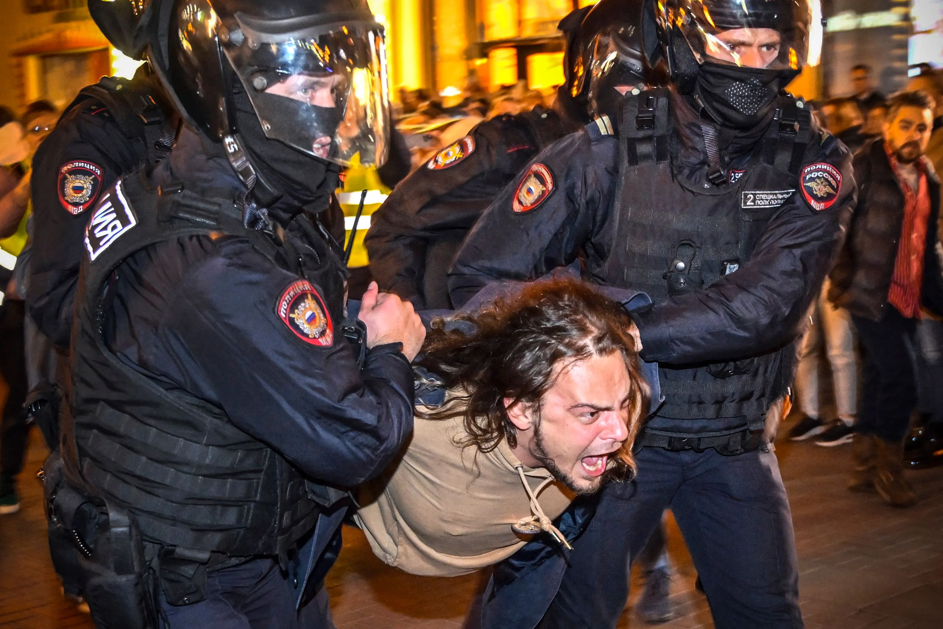 Russian security forces detain a demonstrator on Sept. 21 following calls to protest a “partial” mobilization ordered by Vladimir Putin.&nbsp; More than 1,300 people were detained at demonstrations across Russia, a police monitoring group said.