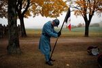 A World War I reenactor waits for the arrival of French President Emmanuel Macron during a ceremony marking the centennial of the war’s end&nbsp;in Morhange, France, on Nov. 5.