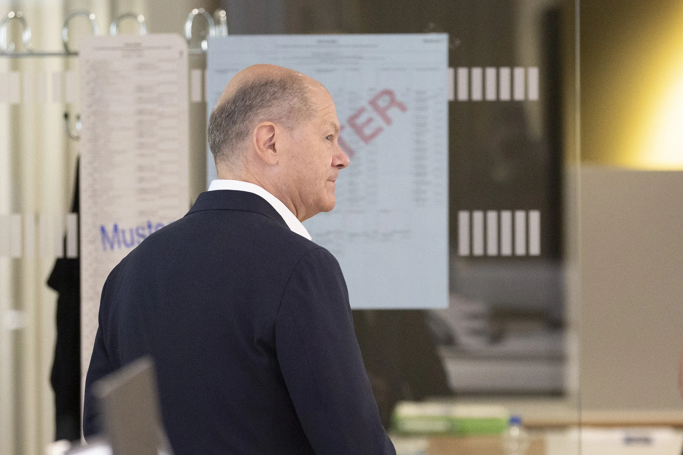 Olaf Scholz waits to cast a ballots in European parliamentary elections in Postdam, Germany, on June 9.