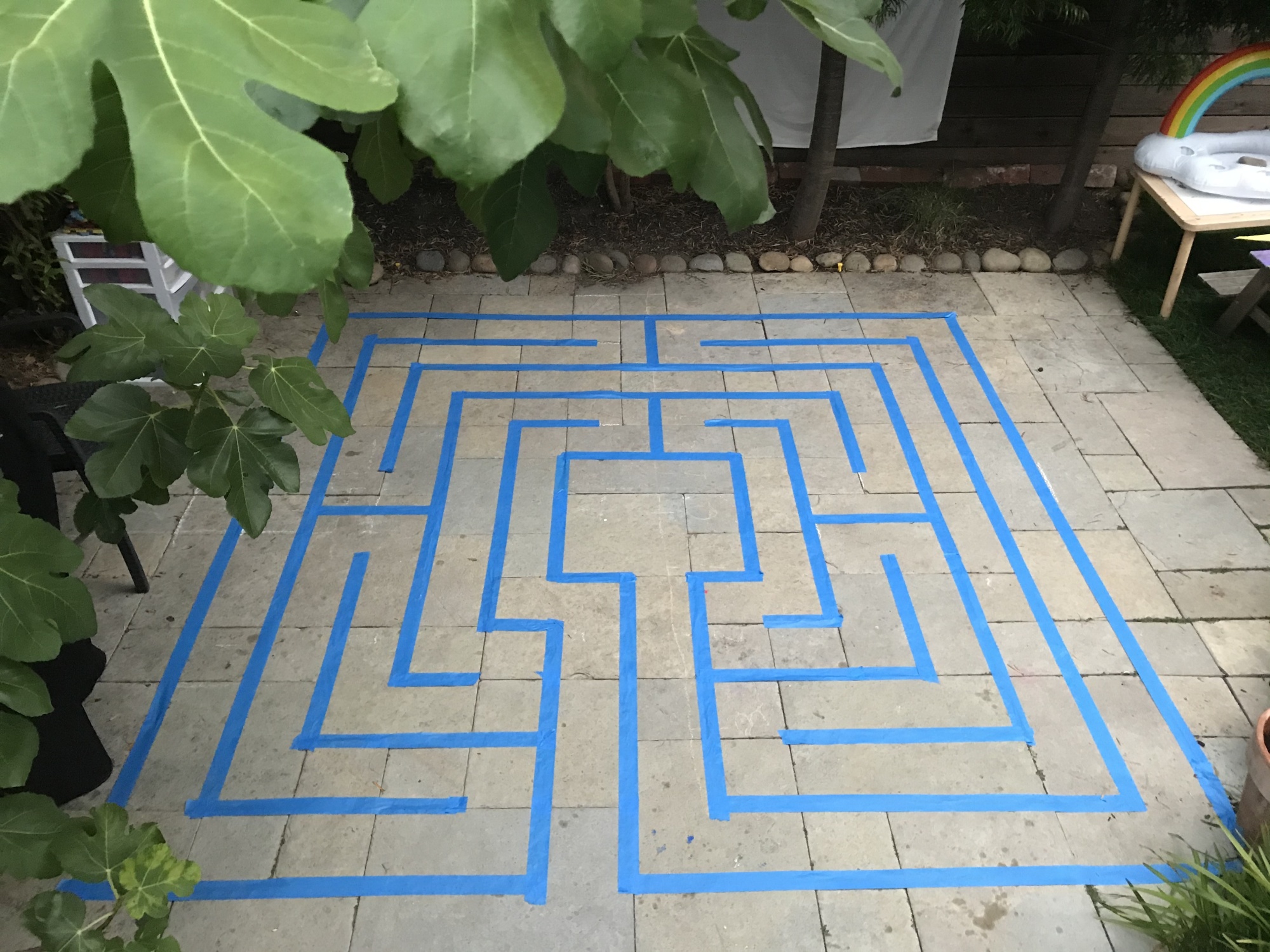 A simple tape labyrinth on craftsman Lars Howlett’s back patio in Oakland, California.&nbsp;