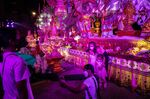 Visitors take photos at Tha Phae Gate during the Loy Krathong festival in Chiang Mai on Nov. 19.