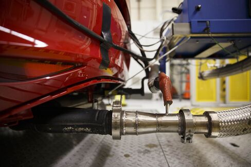 The portable emissions testing system is attached to the exhaust of a Volkswagen Golf