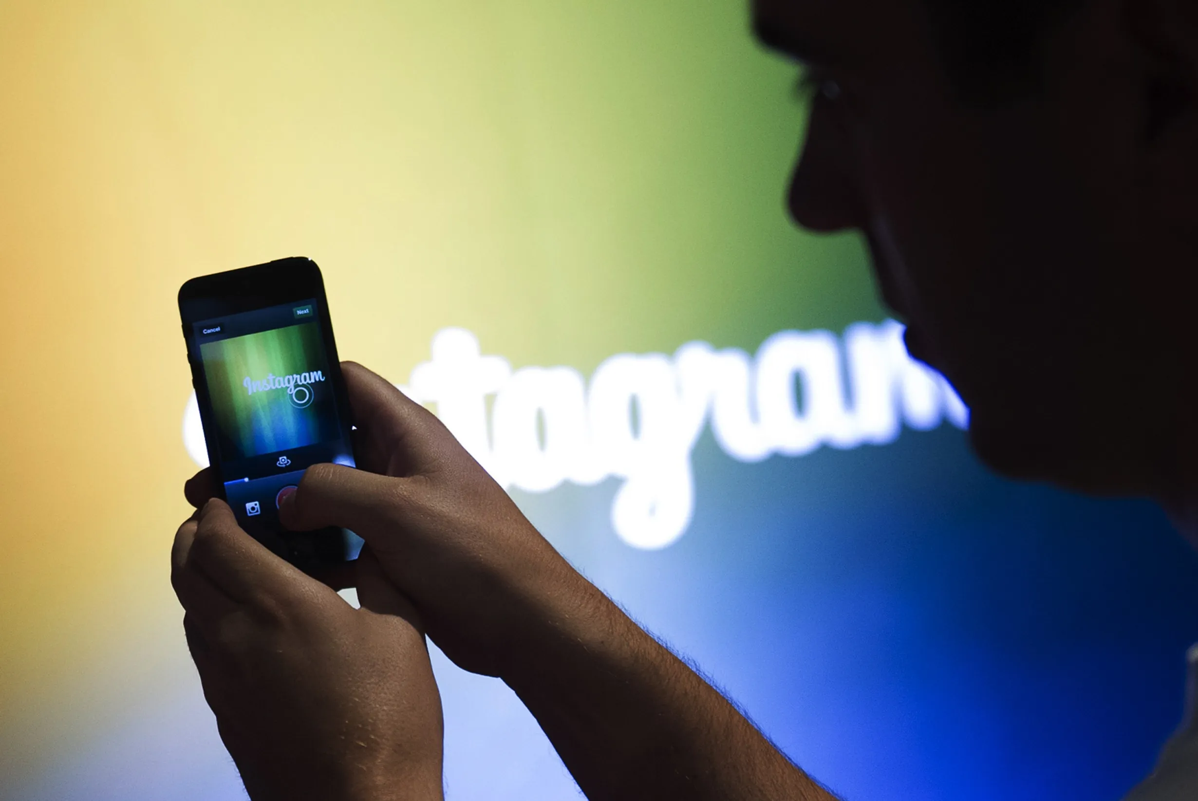 A Facebook Inc., employee demonstrates the new video feature with Instagram during an event at Facebook Inc. headquarters in Menlo Park, California, U.S., on Thursday, June 20, 2013.
