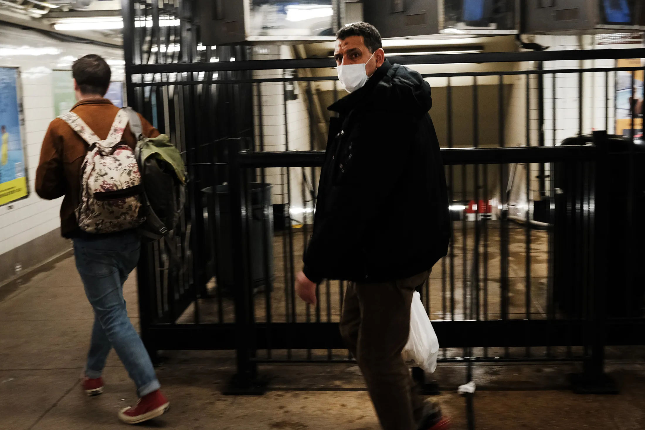 A man wears a protective&nbsp;mask&nbsp;in the New York City subway on March 11.