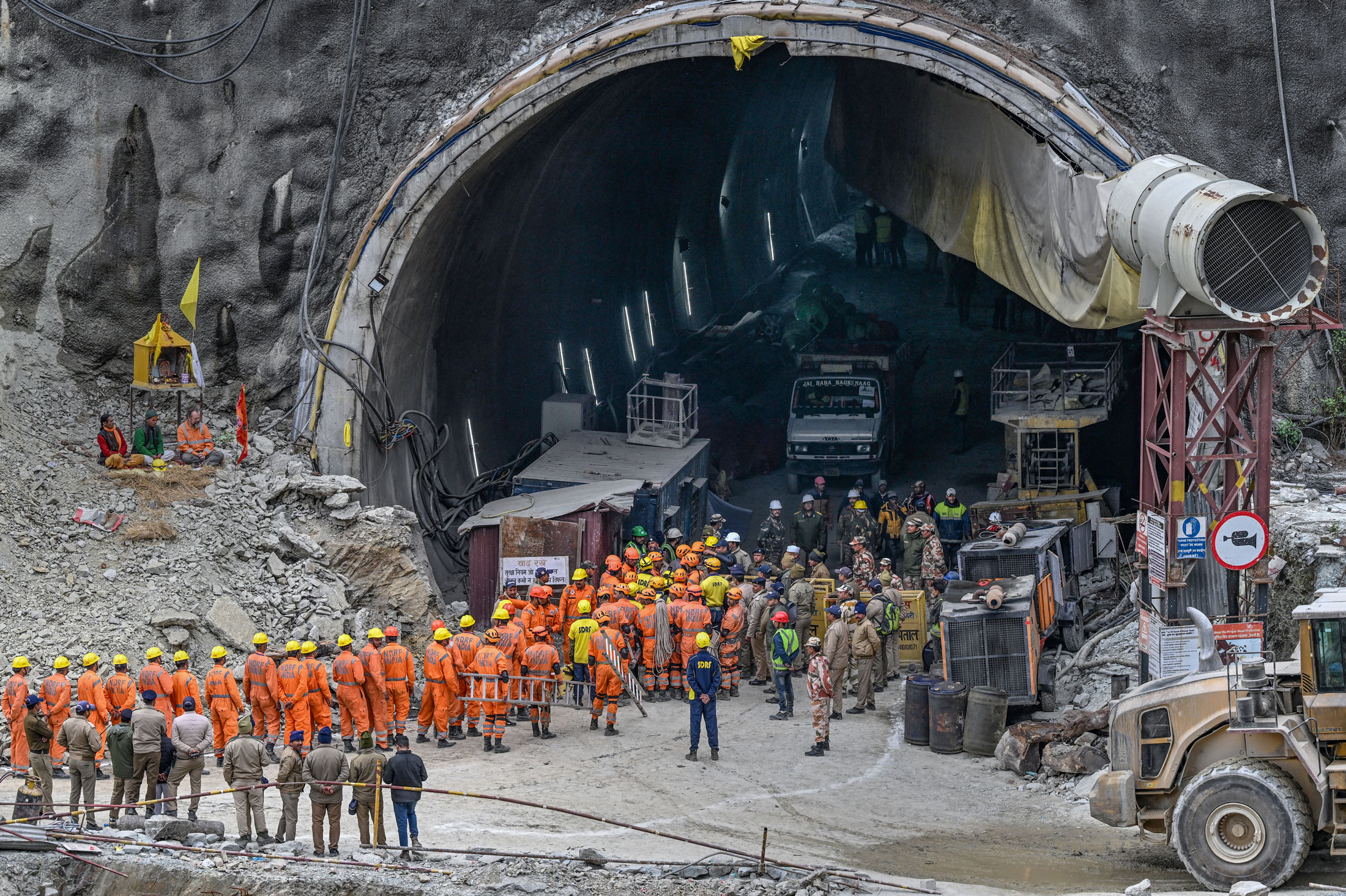 Rescue workers near the collapsed Silkyara tunnel in Uttarakhand state, India, on Nov. 28.