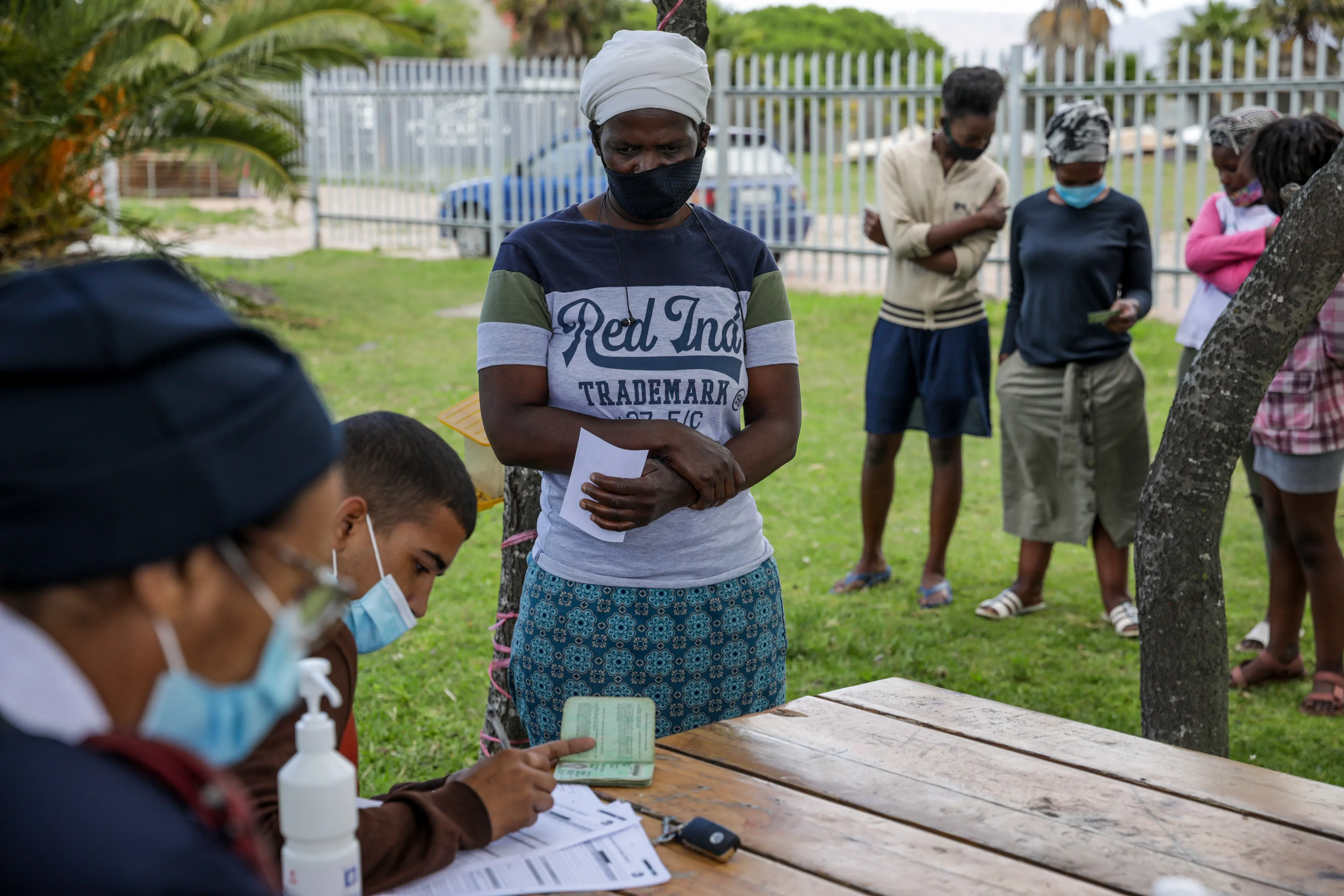 A resident registers at a vaccination point in the Egoli township of Cape Town, South Africa, on Nov. 30.