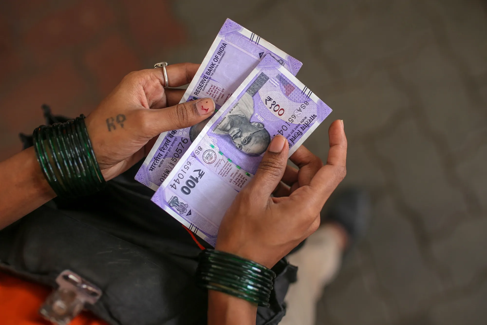 The rupee is expected to appreciate to 82 per dollar by the year-end, from about 83.50 currently.
