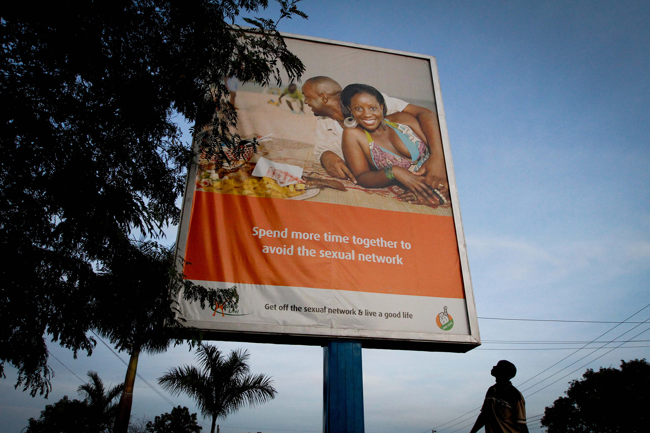 A billboard on the outskirts of Kampala, Uganda, in 2011 urges people to  be faithful to their partners to stop the spread of  HIV.
