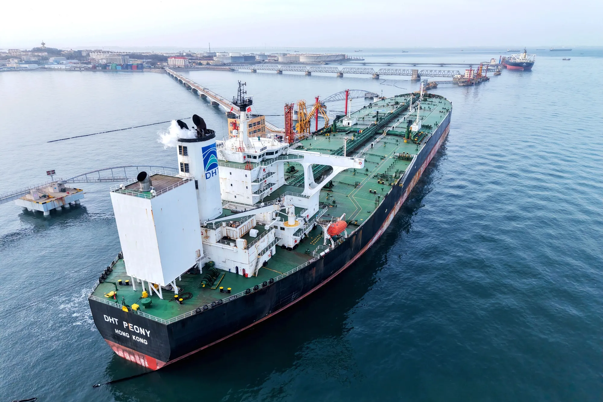 A tanker offloads imported crude oil at Qingdao Port in China.&nbsp;